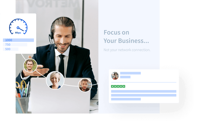 man smiling at laptop